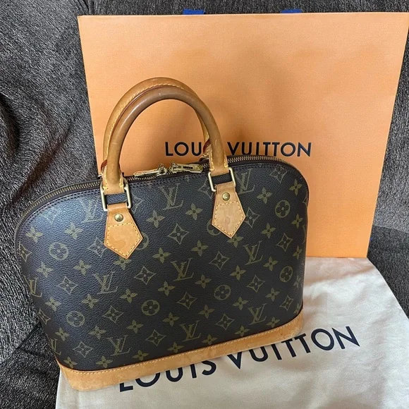 Louis Vuitton Alma in Monogram - Picture 1 of 13